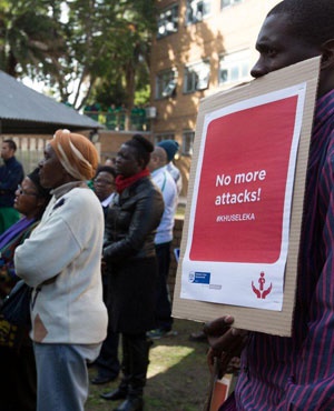 Western Cape health workers, community members, and EMS personnel hold a symbolic walk for staff safety following a spate of attacks on paramedics. (Supplied, Western Cape Government)