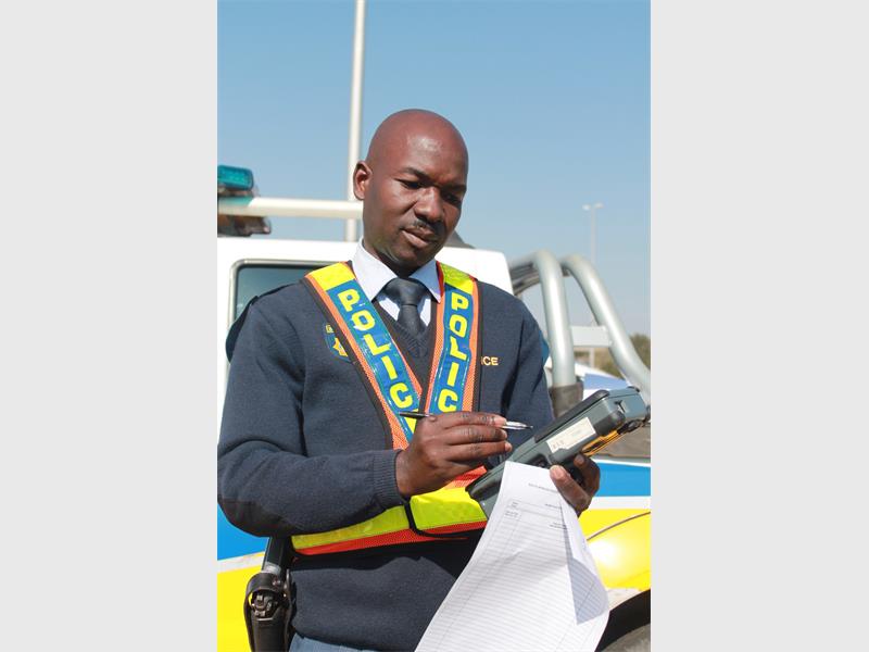 Sector 1 manager, Warrant Officer Simon Ndubane at the roadblock in Morninghill.