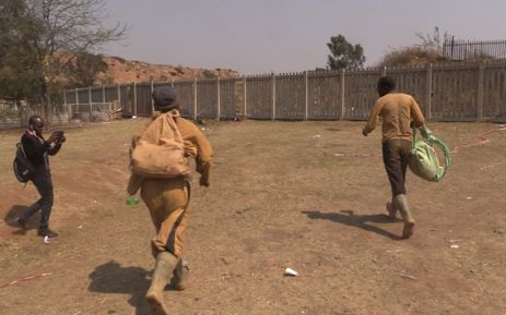 Illegal miners emerge from Langlaagte mine after being underground for more than two weeks.Picture: Kgothatso Mogale