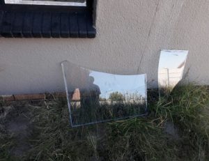 The window glass removed by the criminal at a home in Thistle Grove.