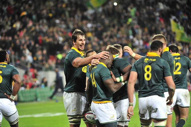 Eben Etzebeth (captain) of the Springboks celebrates Raymond Rhule of the Springboks scoring during the 2017 Rugby Championship game between South Africa and Argentina at Nelson Mandela Bay Stadium, Port Elizabeth on 19 August 2017.