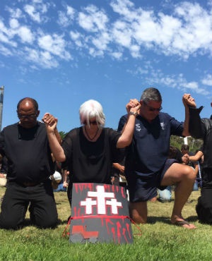 The Black Monday protesters in Cape Town pray during the protest against farm murders on Monday. (Aletta Harrison, News24)