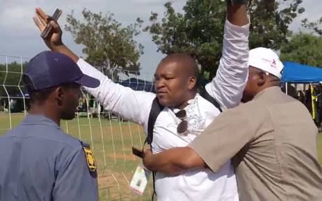 Sam Mkokeli manhandled by security at Nasrec. Picture: ShoeShoe Qhu/Kaya FM