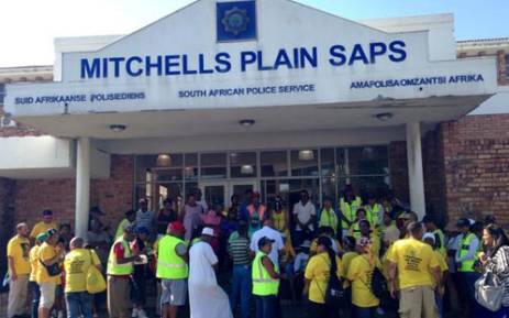 FILE: Mitchells Plain residents gather at the local police station before embarking on a march against gangsterism and drugs on Saturday 12 April 2014. Picture: EWN.